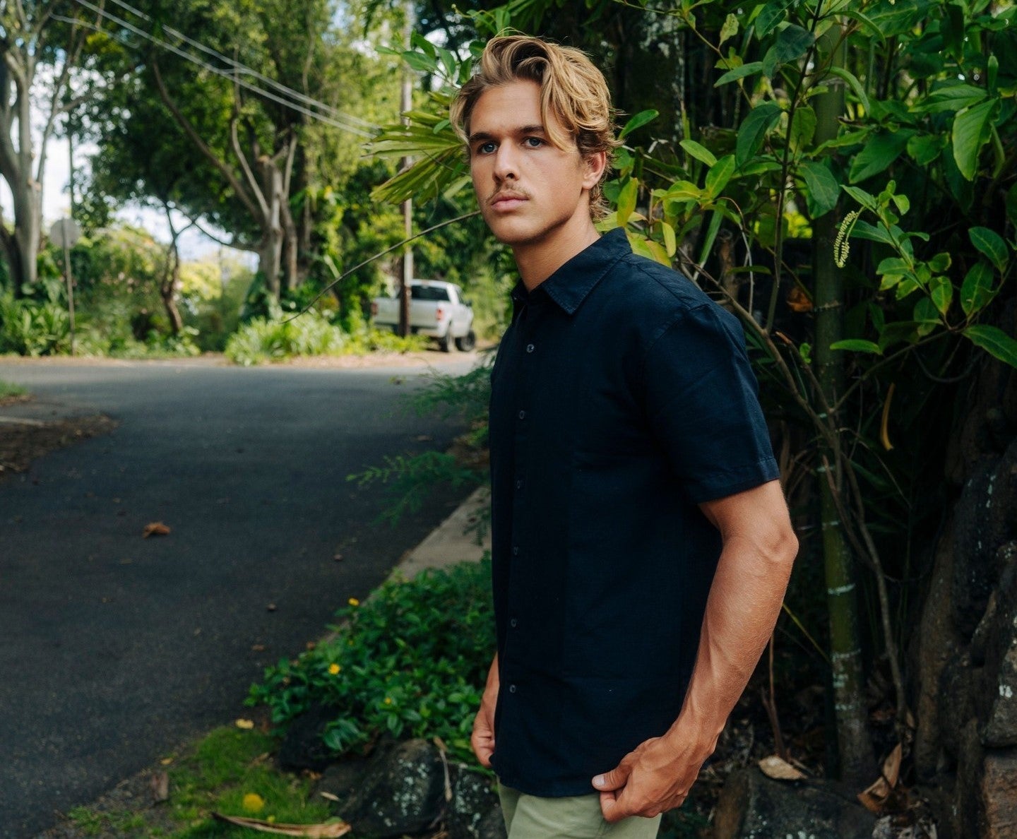 young man wearing eco-friendly travel clothes