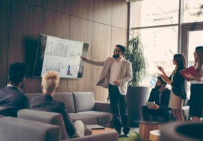 a business person giving. a presentation to their team