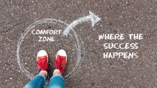 a photo implying success happens when you step outside your comfort zone