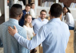 a newly hired employee is presented to the team