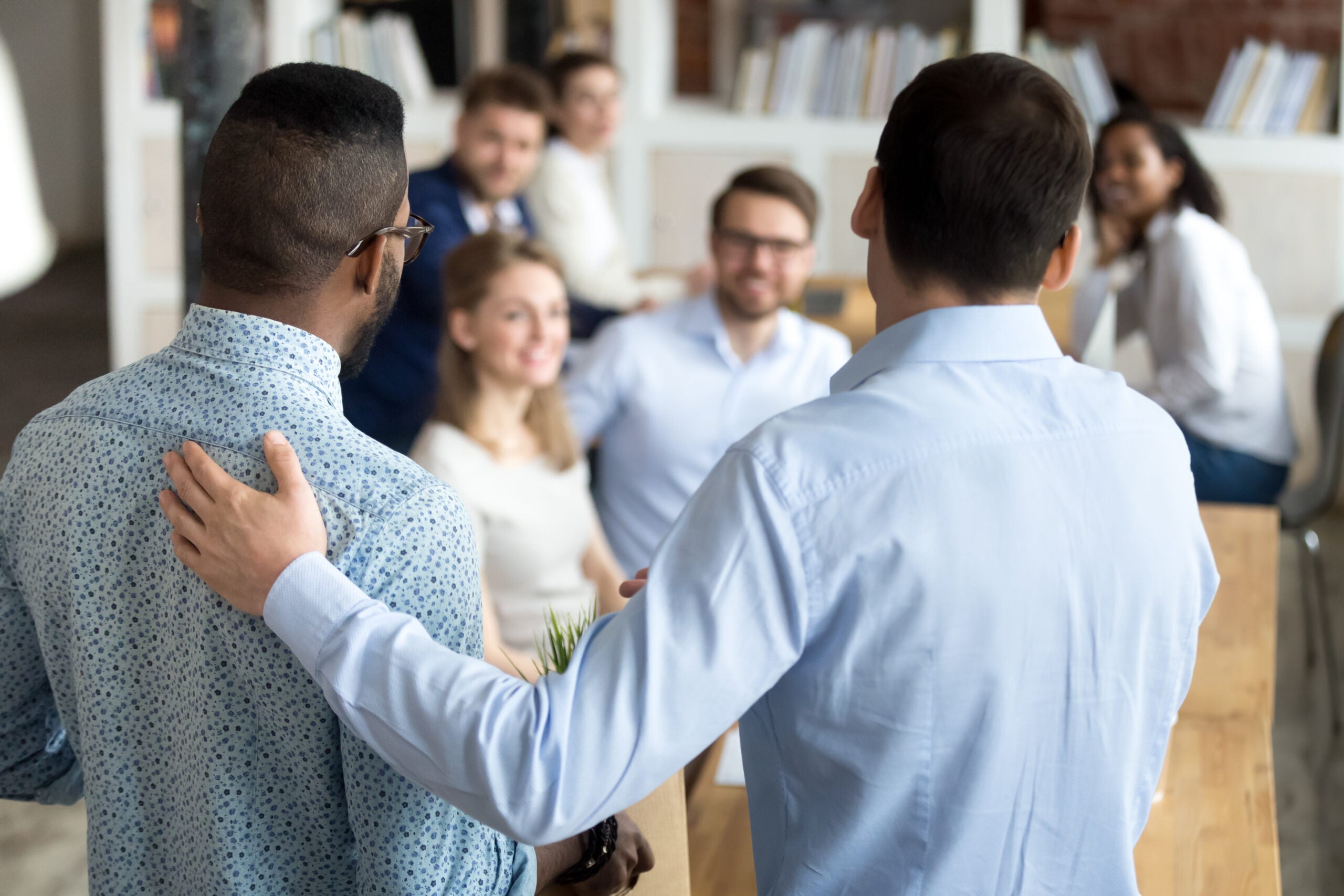 a newly hired employee is presented to the team