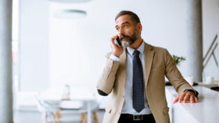 a business man on a phone call