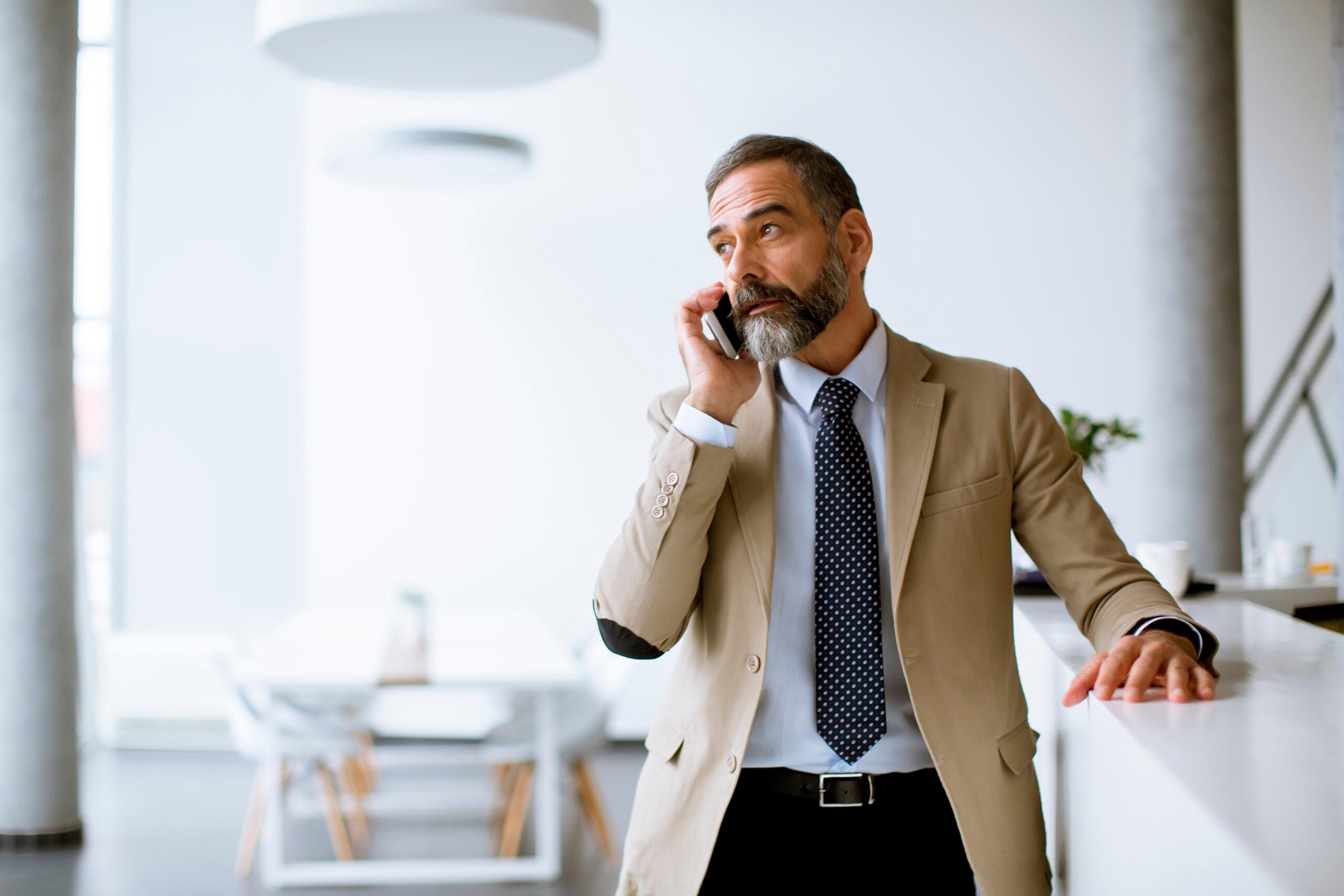 a business man on a phone call