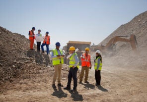 a group of construction workers and managers on site