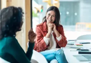 A business coach talking with a client