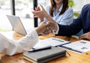 Managers and job applicants shake hands after the job interview, job interviews to find people to work with the company and talent to work with. Concept of recruitment and job interviews.