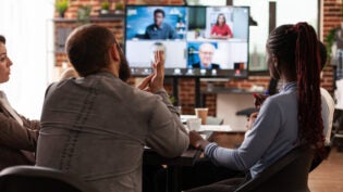 a team of employees having a virtual meeting