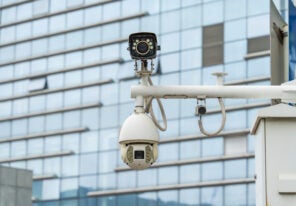 CCTV surveillance camera on building window