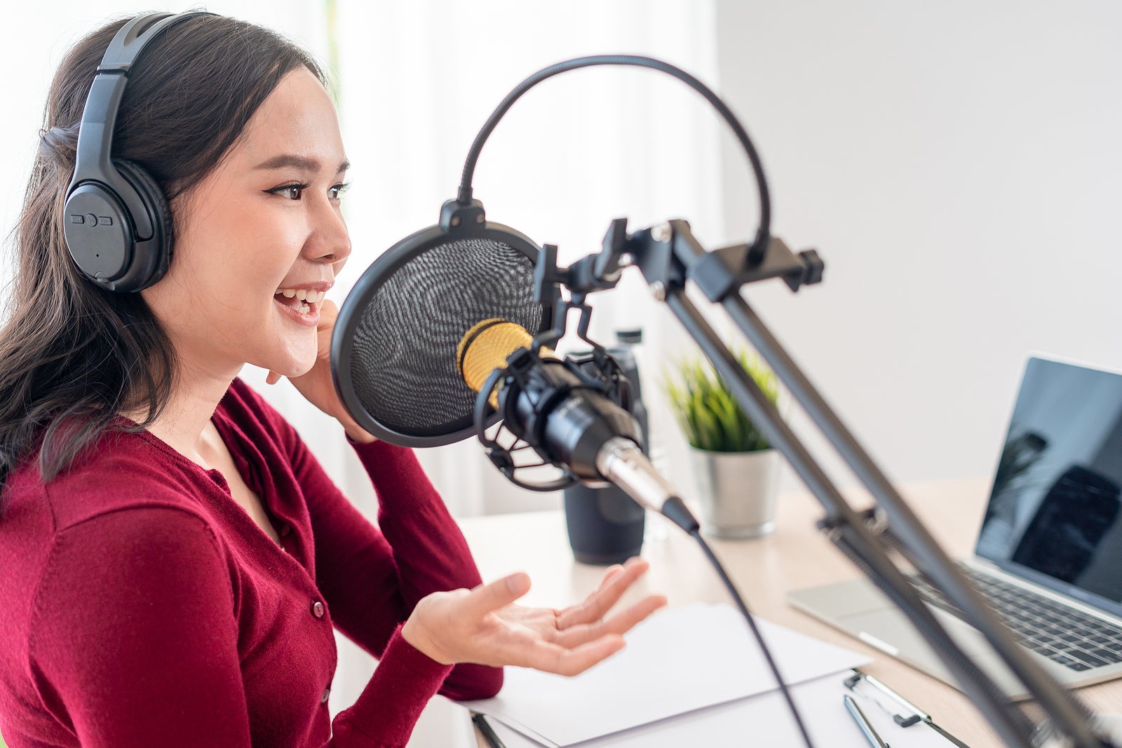 a podcaster working from her home