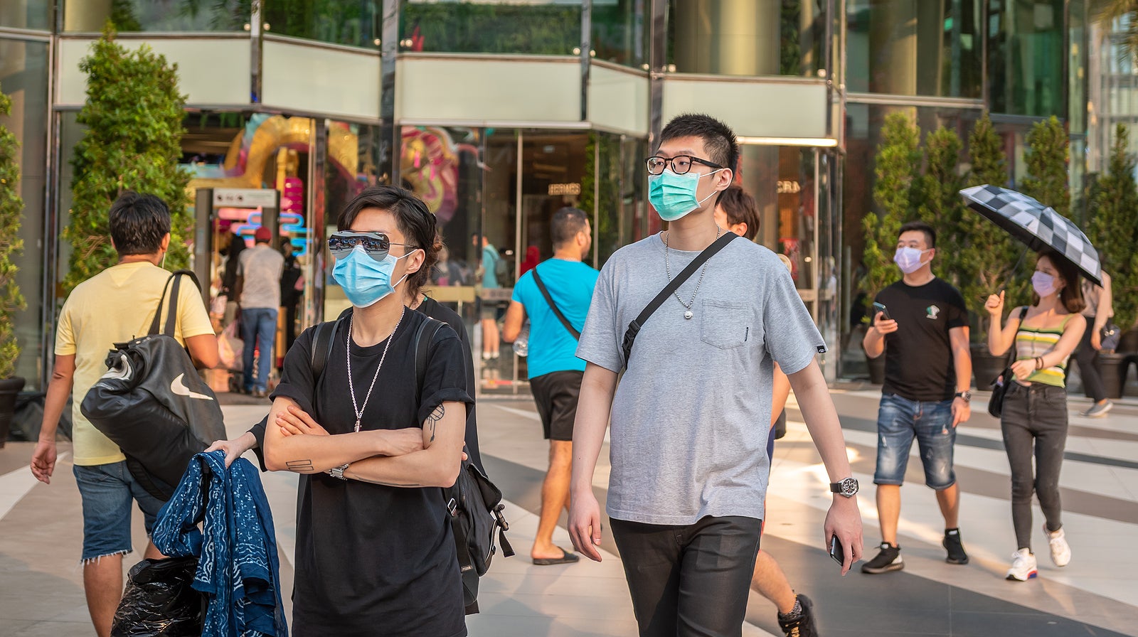 Bangkok, Thailand on February 3, 2020: Shoppers wearing face masks at Siam Paragon Mall as Corona virus spreads and to protect from smog pollution PM 2.5