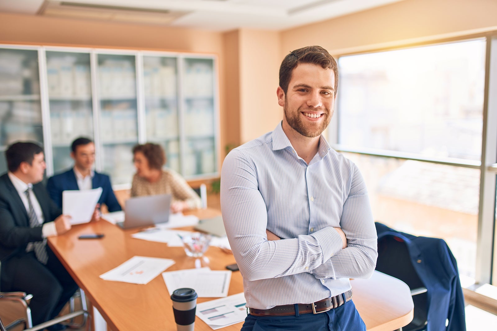 Business lawyers workers meeting at law firm office. Professional executive partners working on finance strategry at the workplace. Leader worker standing confident looking at the camera.