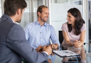 smiling at a business meeting