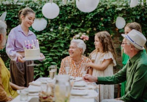 a multi generational family celebrating a birthday