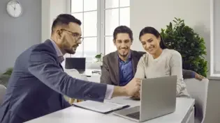 a business owner talking with customers