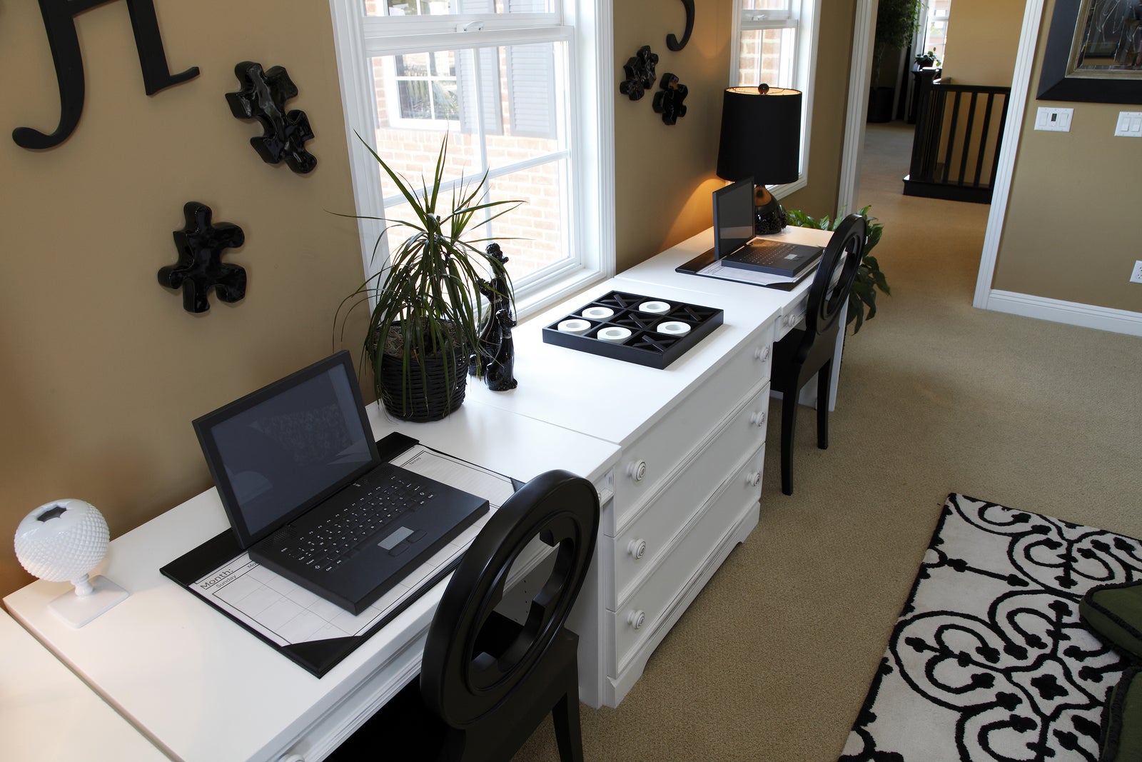 Luxury home office desk with two computers.