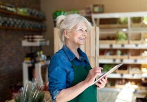 a retired woman enjoying managing her franchise business