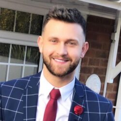 Young professional man in beard and suit